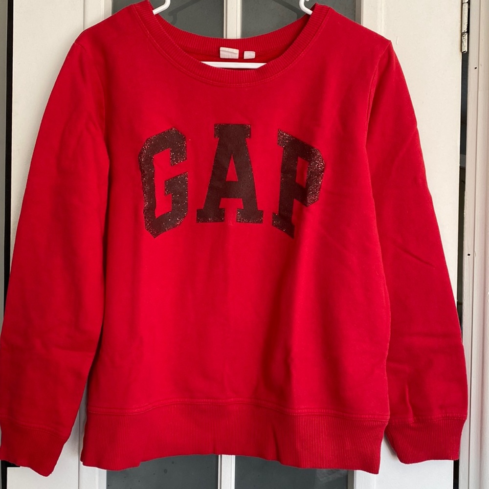 Gap women’s red cropped oversized sweatshirt with sparkly “Gap” lettering